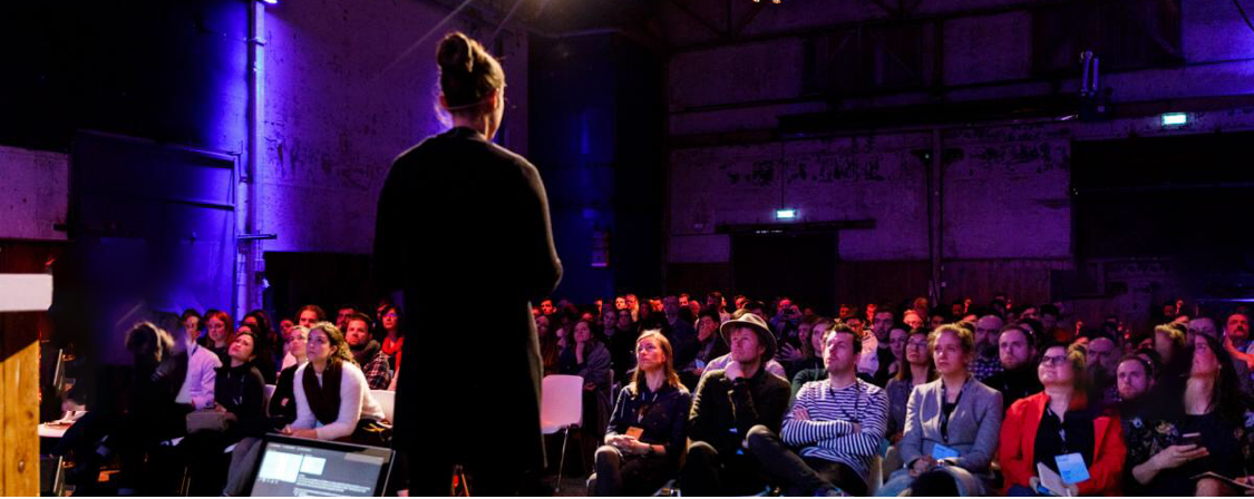 Colette Kolenda presenting on stage